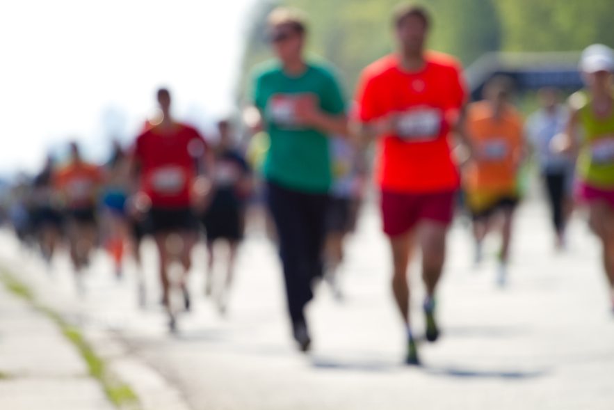 Blurred mass of marathon runners