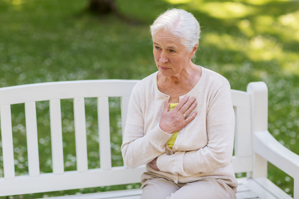 old age, health problem and people concept - senior woman feeling sick at summer park